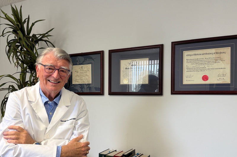 George W. Carroll, MD