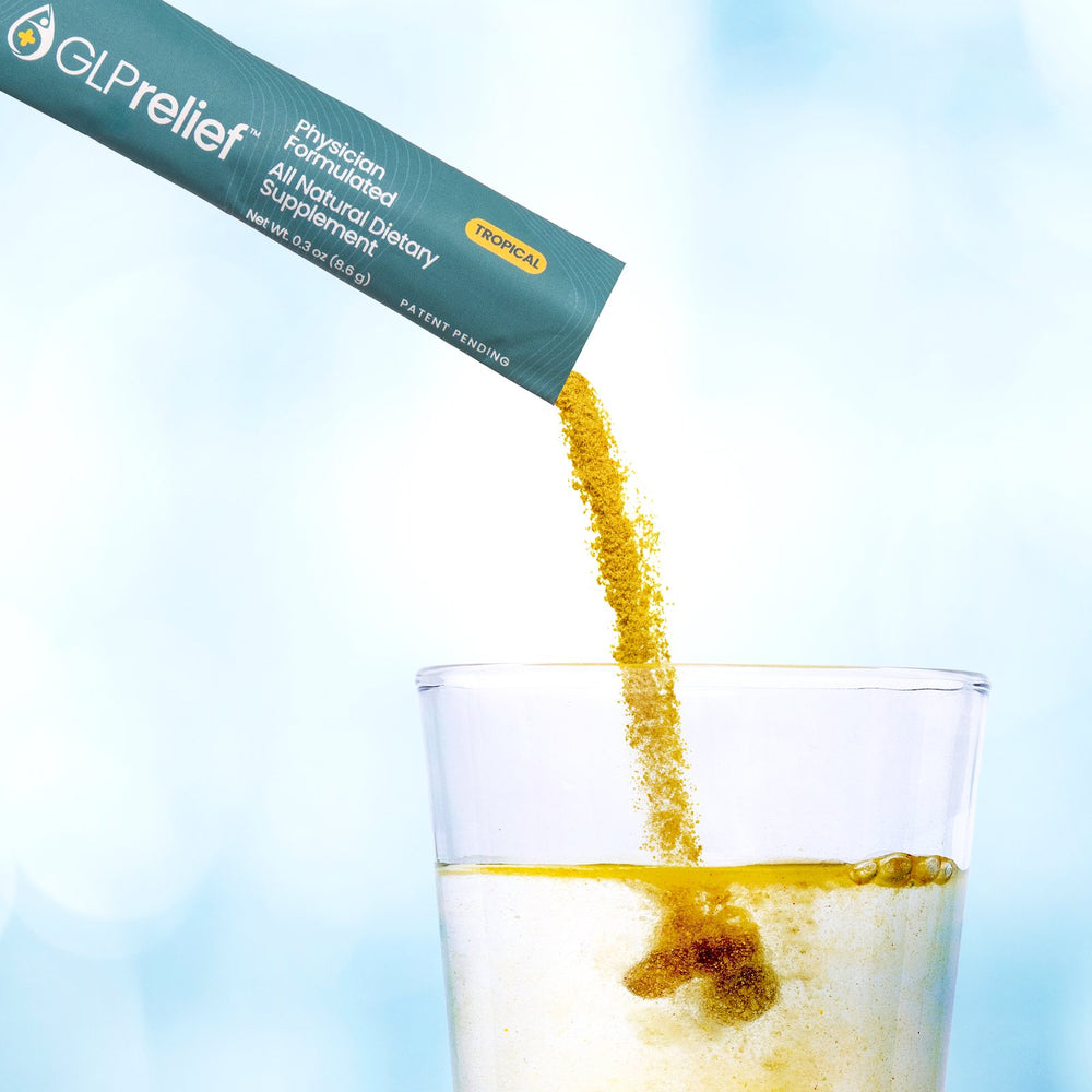 Powder pouring from a GLPrelief stick pack into a glass of water